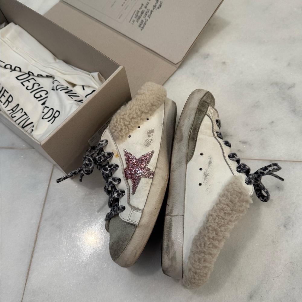 Golden Goose shearling sabot.